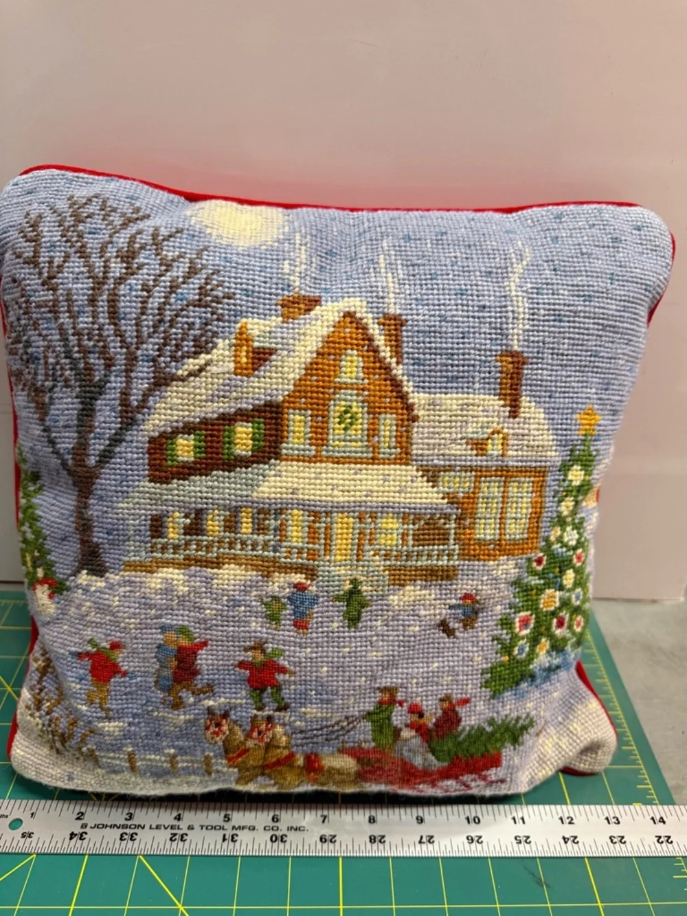 Needlepoint Tramme CHRISTMAS ICE SKATERS Pillow Cover with Red Velvet back.